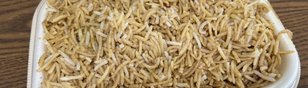 セブンイレブン エリックサウス監修 骨付きチキンビリヤニ ひっくり返して加熱